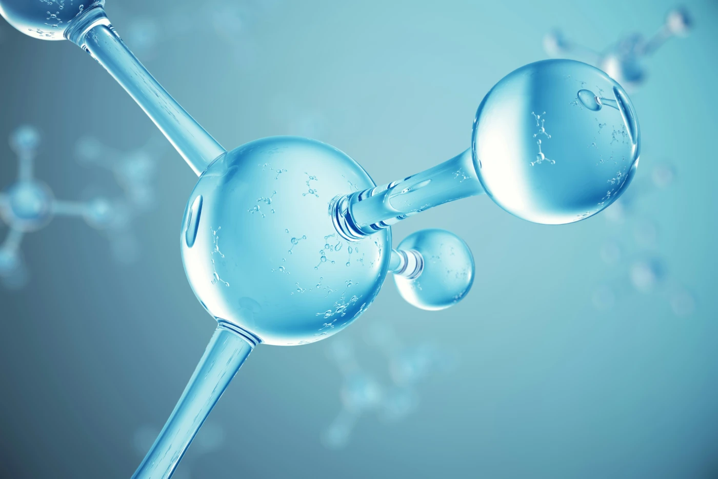 Stylized rendering of three viral particles with surface proteins, the kind of structural model used to visualize Orthohantavirus virions.